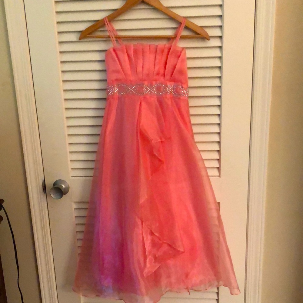 Salmon color.. excellent condition 9-10 children’s